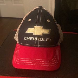Red, White, and Blue Chevrolet hat. Changeable buttons on back of hat